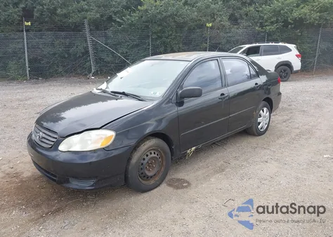 2004 Toyota Corolla Le z USA, uszkodzony, nr VIN JTDBR32E340052883